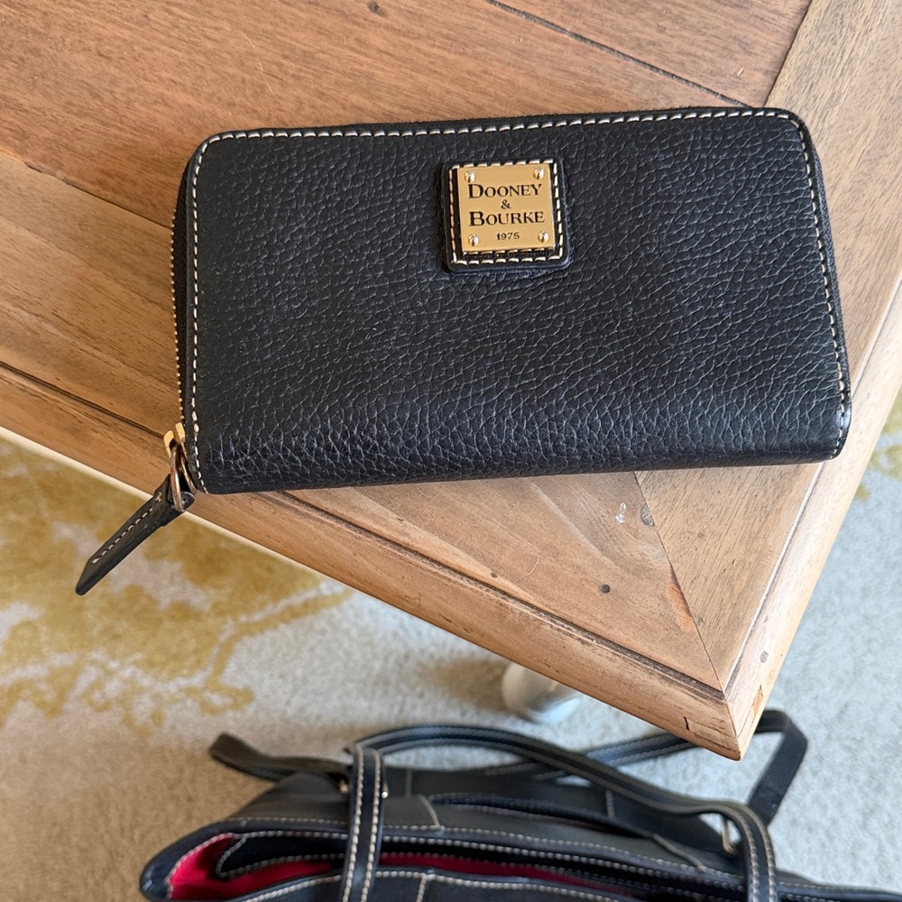 Dooney & Bourke Black Pebbled Zip-Around Leather Wallet with Gold Plaque